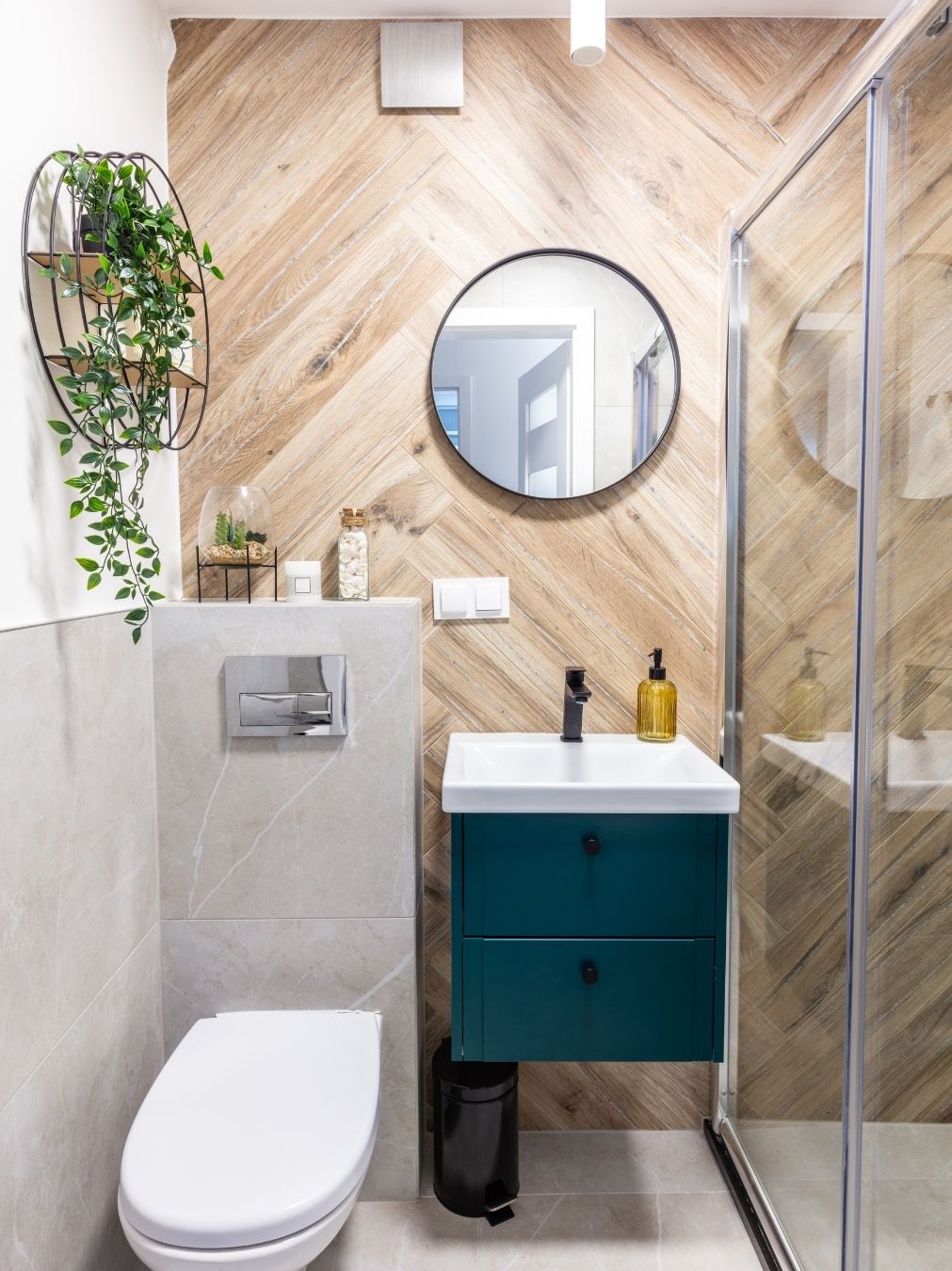 Showcase completed bathroom renovation with marble tiling and freestanding bath