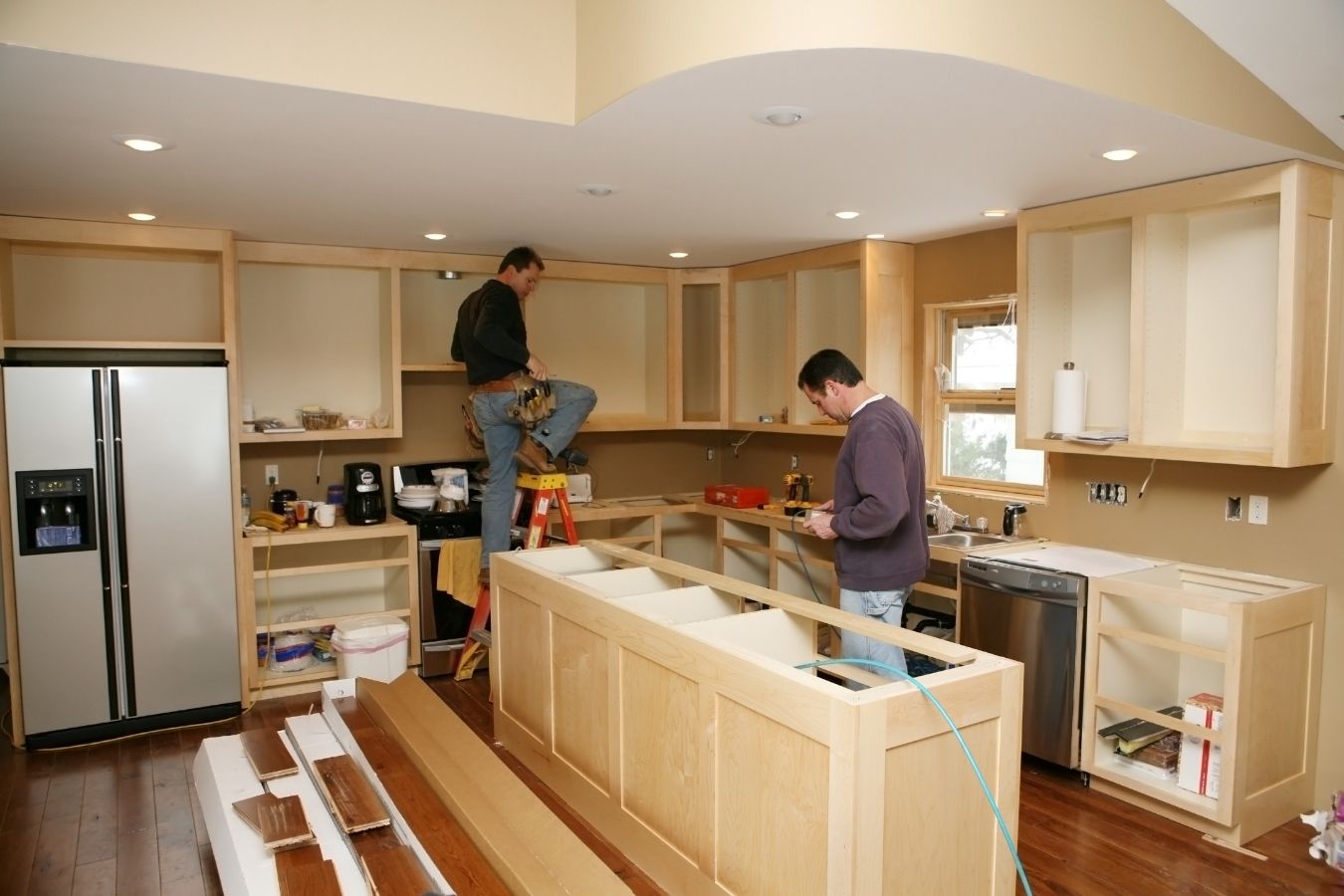 Modern double-island kitchen with marble benchtops