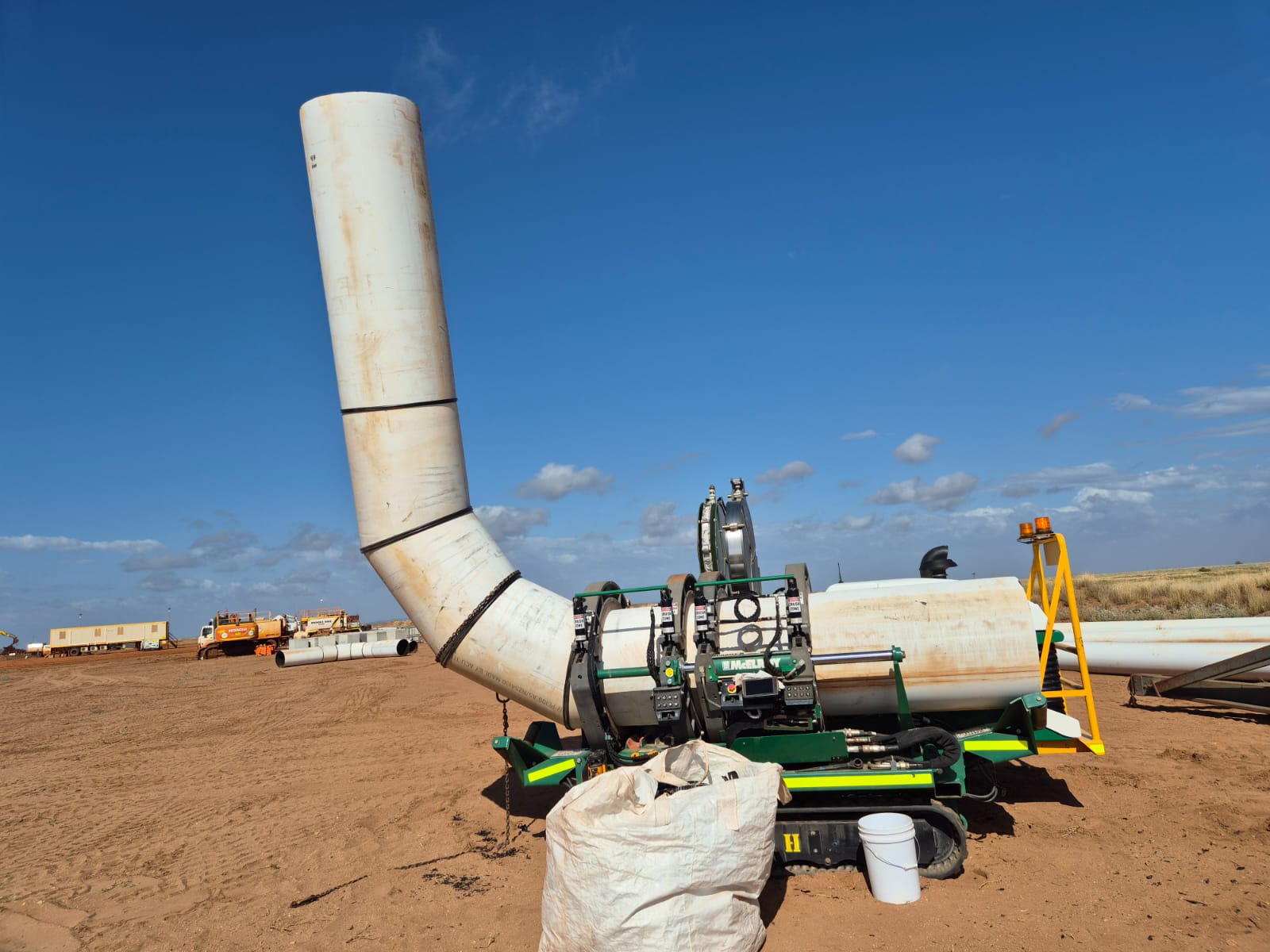 Site crew operating the McElroy fusion rig on a pipeline run